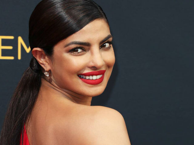 mumbai, Priyanka Chopra, shares sunkissed photo , fun red lipstick