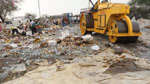 rajnandgaon,Road roller runs, illegal liquor