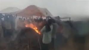 datia,   woman was cremated ,under a tarpaulin