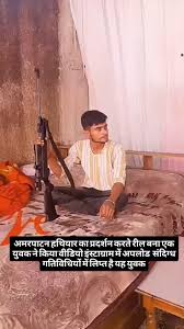 amarpatan, young man ,openly displaying a weapon