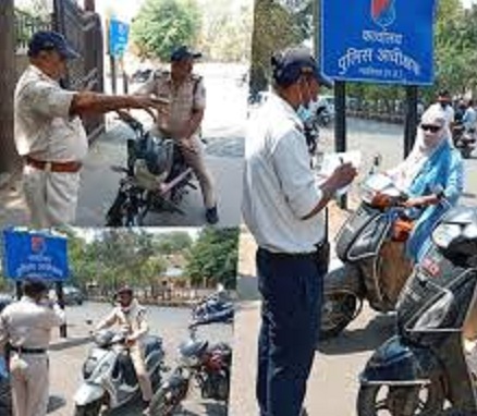 gwalior, Traffic police distributed,  helmets to drivers