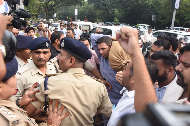 bhopal, Patwari carrying sacks ,d Shivraj