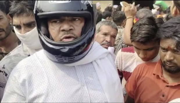 shivpuri,   MLA, wearing a helmet 