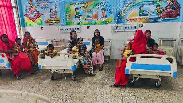 children battling malnutrition, beds lie , nutrition rehabilitation centers